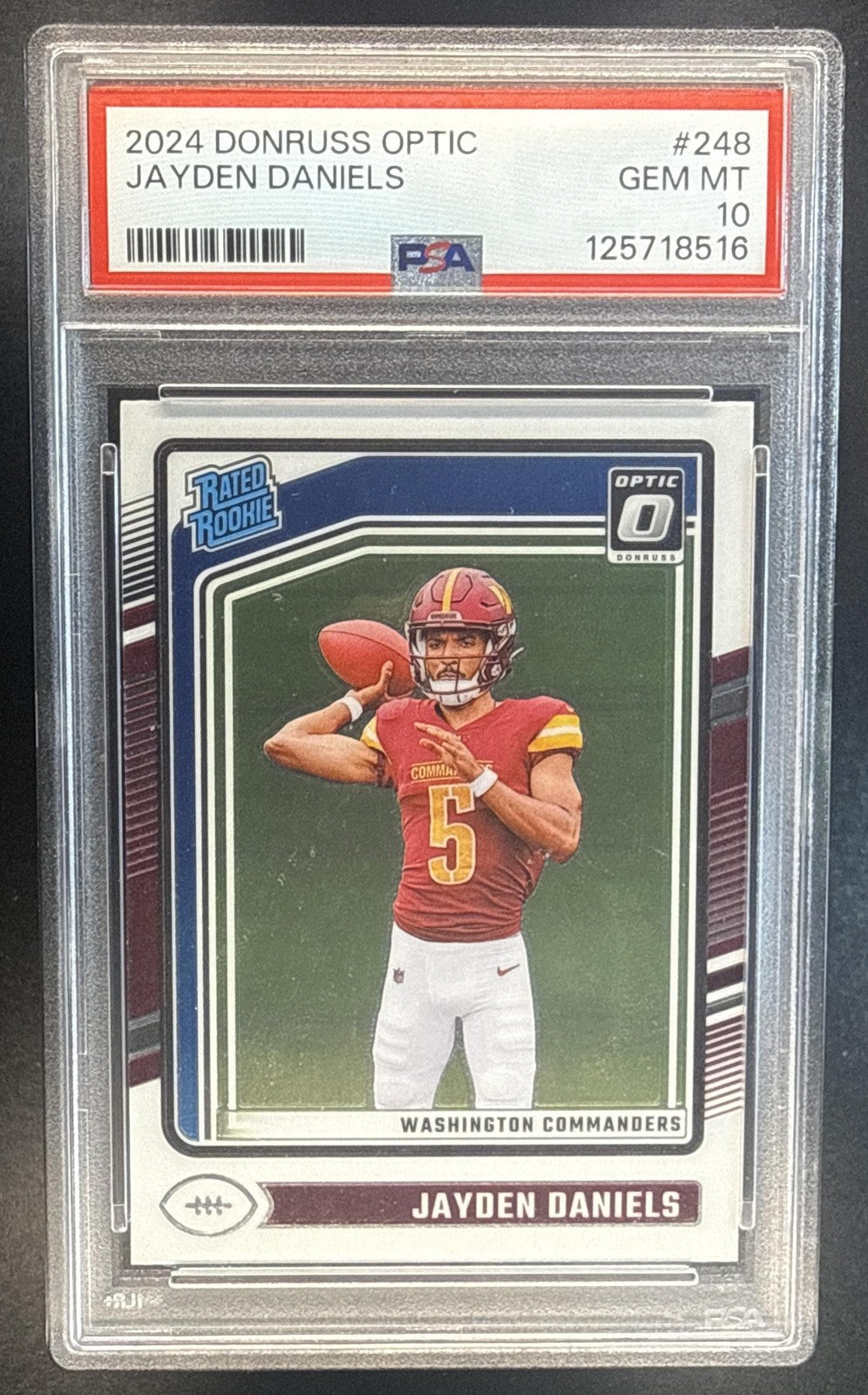 JAYDEN DANIELS 2024 PANINI DONRUSS OPTIC #248 RATED ROOKIE COMMANDERS PSA 10