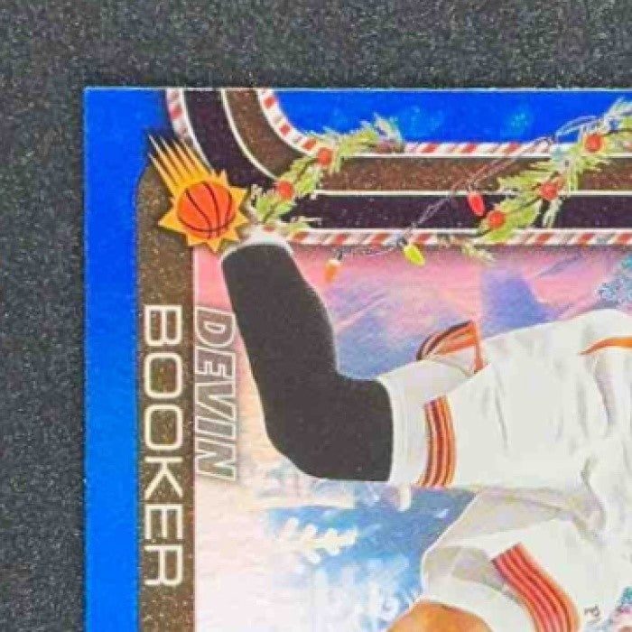 DEVIN BOOKER 2025-26 TOPPS HOLIDAY #H124 BLUE METALLIC GLITTER SUNS