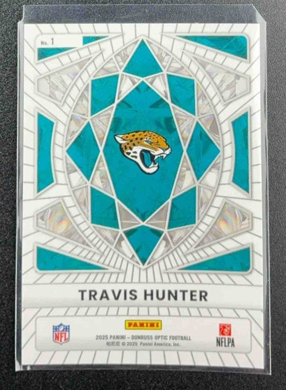 TRAVIS HUNTER 2025 PANINI DONRUSS OPTIC #1 DIAMOND HANDS RC JAGUARS