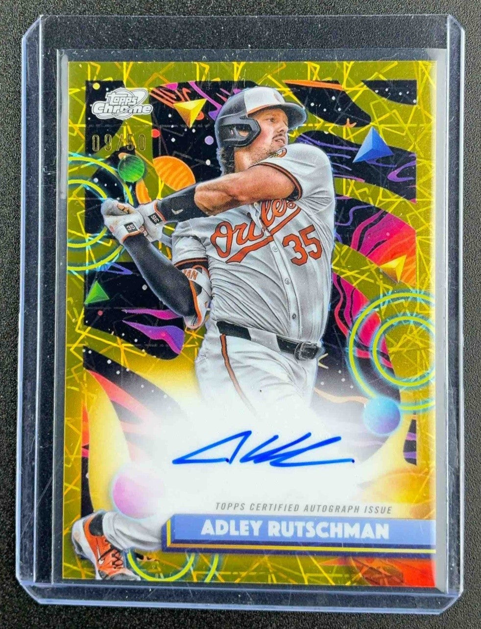 2025 Topps Cosmic Chrome Adley Rutschman Auto Gold Interstellar Refractor /50