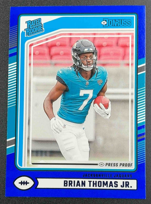 BRIAN THOMAS JR. 2024 PANINI DONRUSS #313 PRESS PROOF BLUE RATED ROOKIE JAGUARS