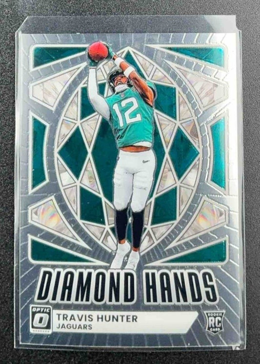 TRAVIS HUNTER 2025 PANINI DONRUSS OPTIC #1 DIAMOND HANDS RC JAGUARS