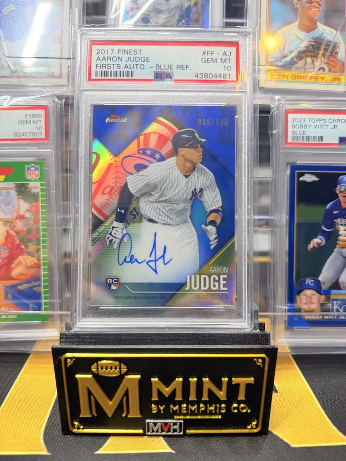 A 2017 Topps Finest Aaron Judge rookie autograph graded PSA 10, from a newly arrived collection, standing behind the Mint By Memphis nameplate.