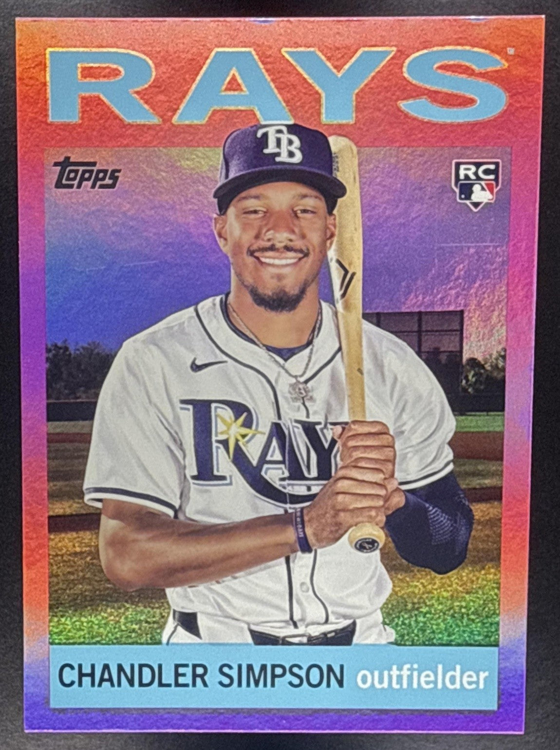 CHANDLER SIMPSON 2025 TOPPS ARCHIVES #27 1964 DESIGN PINK FOILBOARD RC RAYS