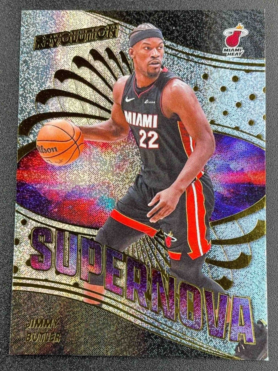 JIMMY BUTLER III 2024-25 PANINI REVOLUTION #19 SUPERNOVA NEUTRON 86/125 HEAT