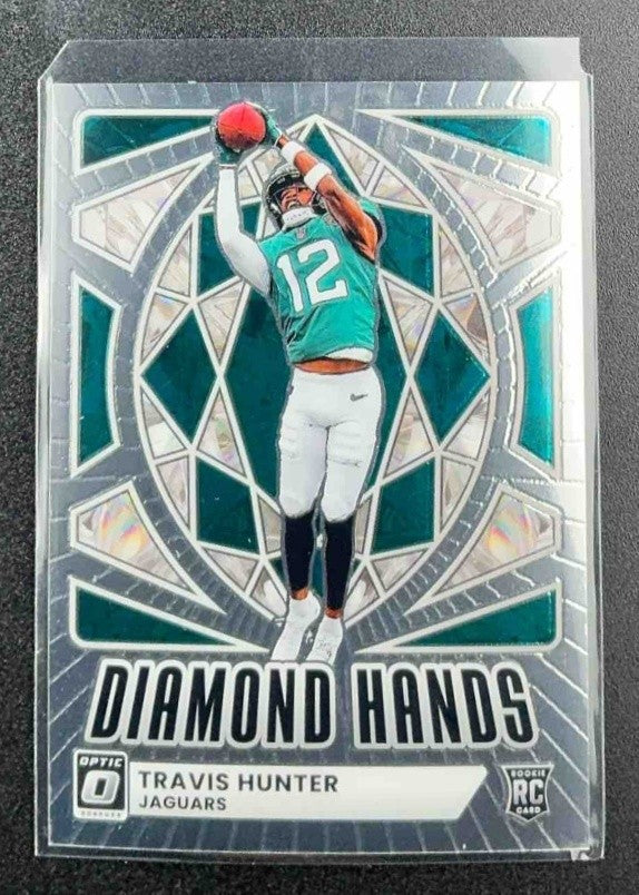 TRAVIS HUNTER 2025 PANINI DONRUSS OPTIC #1 DIAMOND HANDS RC JAGUARS