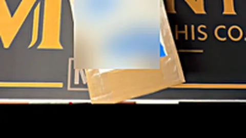 Insured package on the Mint by Memphis backdrop, shipping label and address redacted for privacy